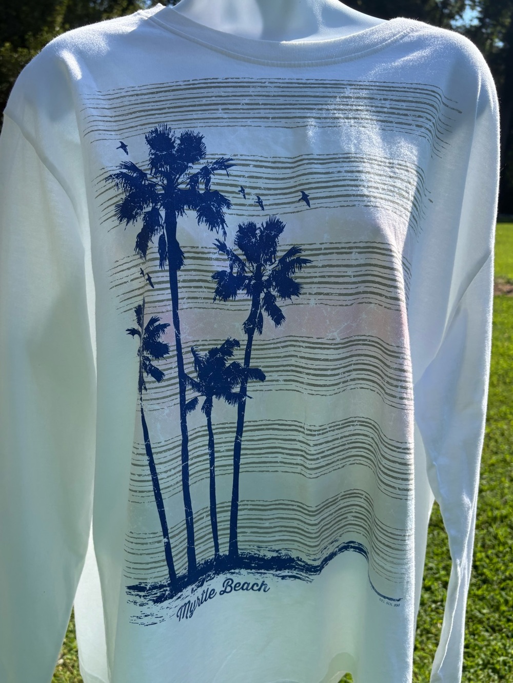 Del Sol Myrtle Beach vacation shirt shifts into bright, tropical hues.